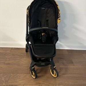 Versace Kids Stroller in Black with Gold Details